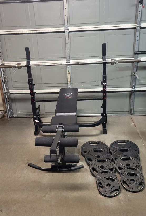 Bench and 250 pounds of weights