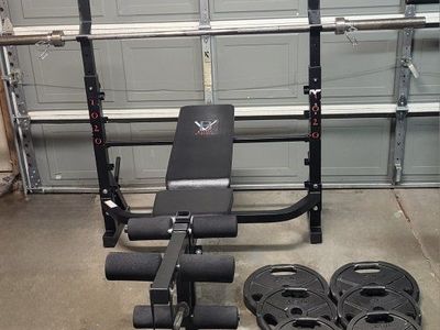 Bench and 250 pounds of weights