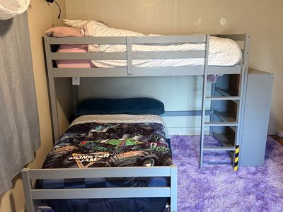 Kids twin bunk beds w/ matching bookshelf