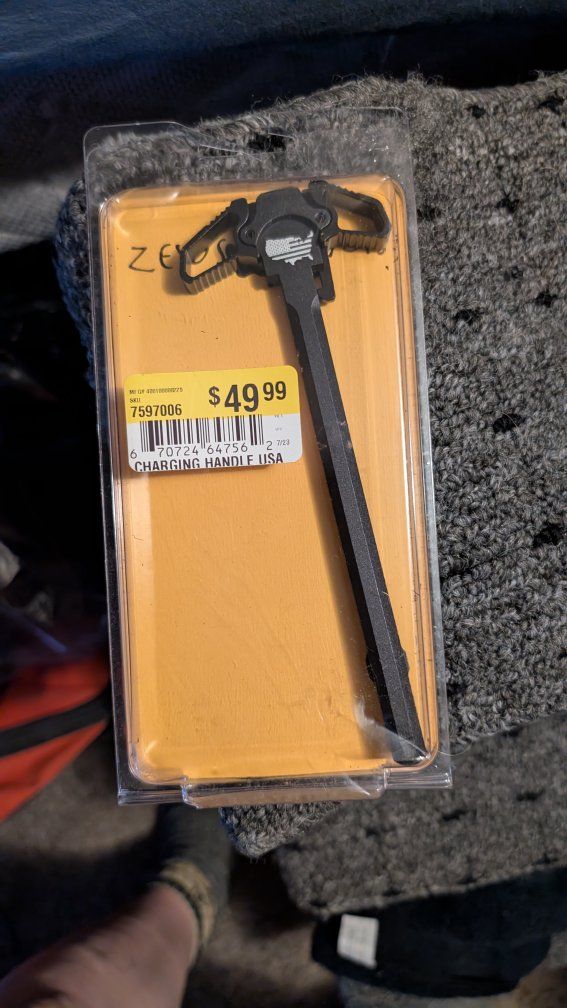 Ambidextrous charger for AR-15