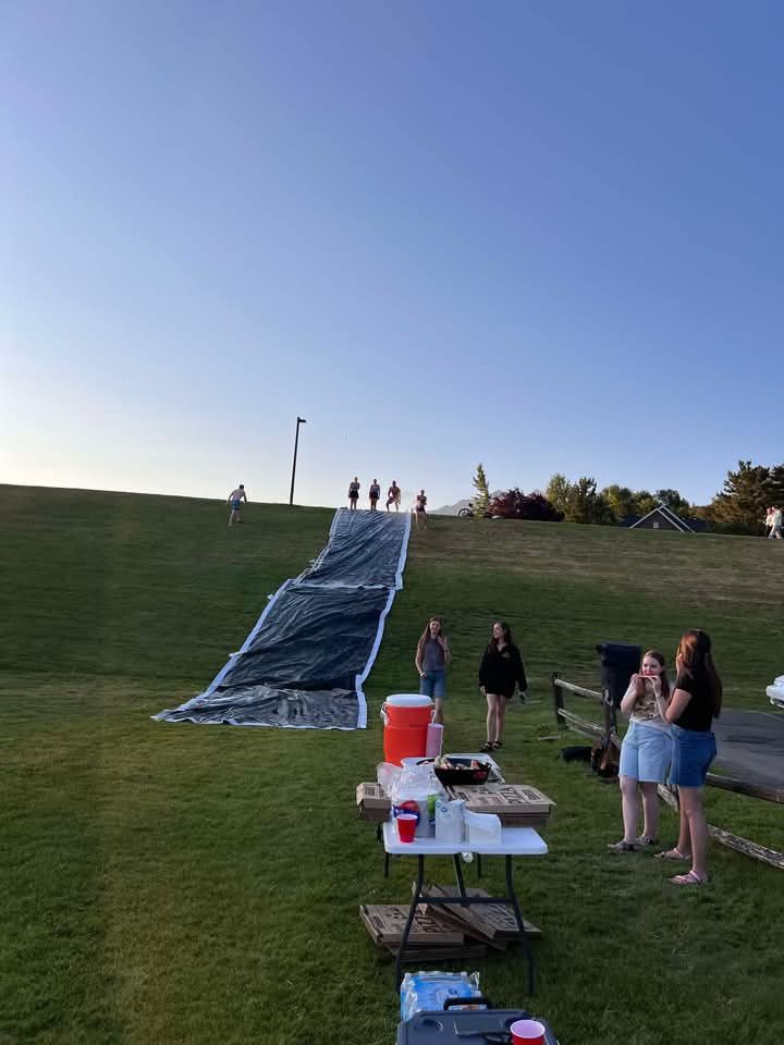 Build a Giant Slip N Slide This Summer
