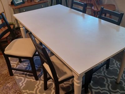 Dining table & four chairs.