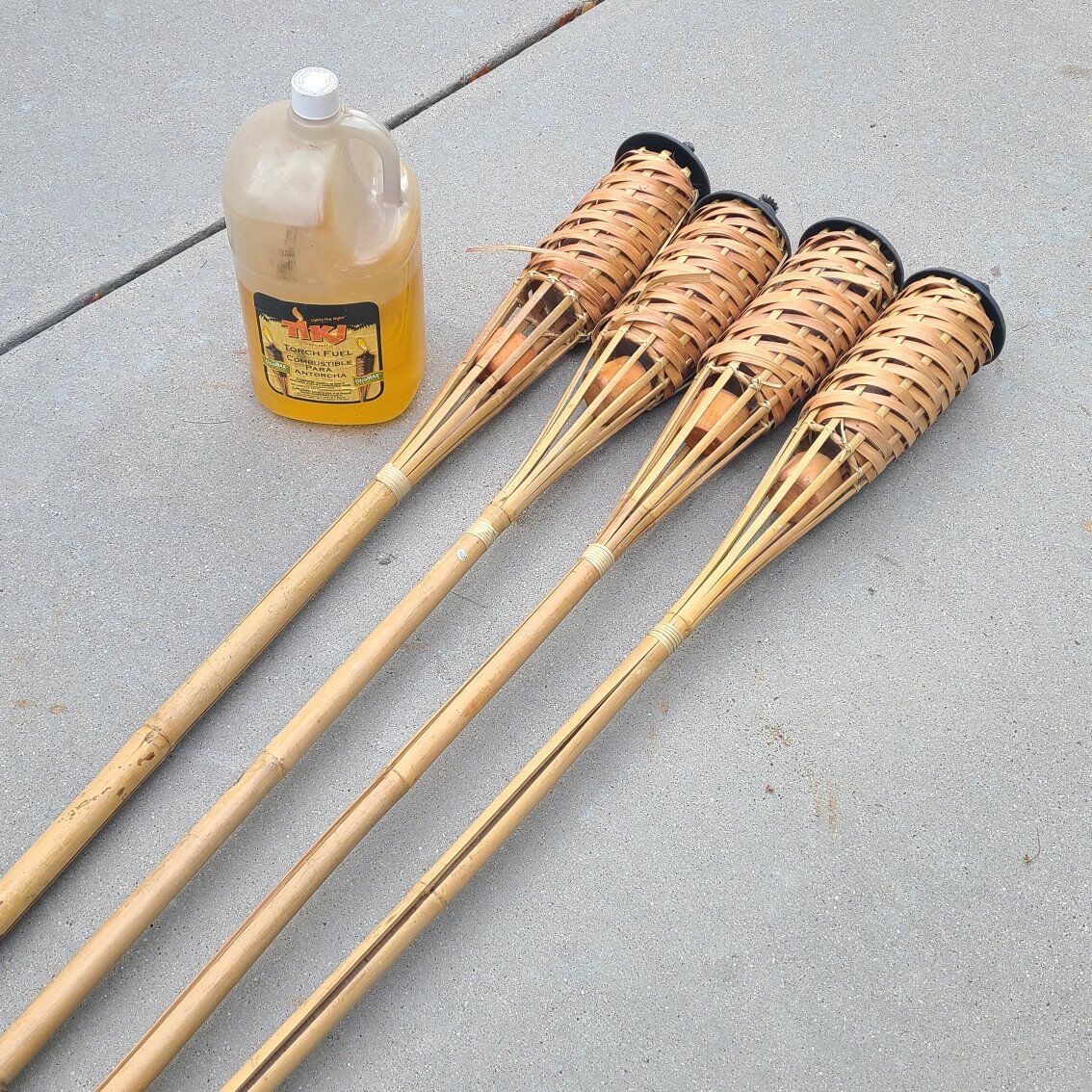 4 Tiki Torches + Fuel