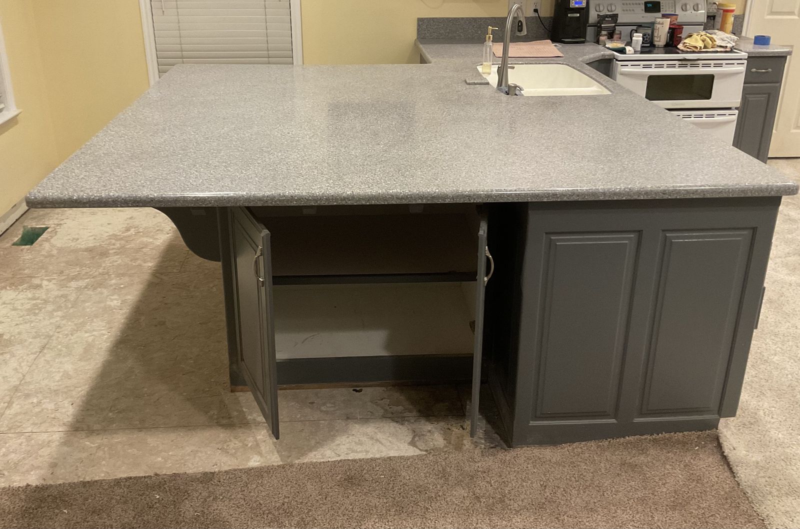 Work bench counter top with cabinets.