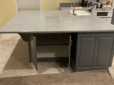 Work bench counter top with cabinets.