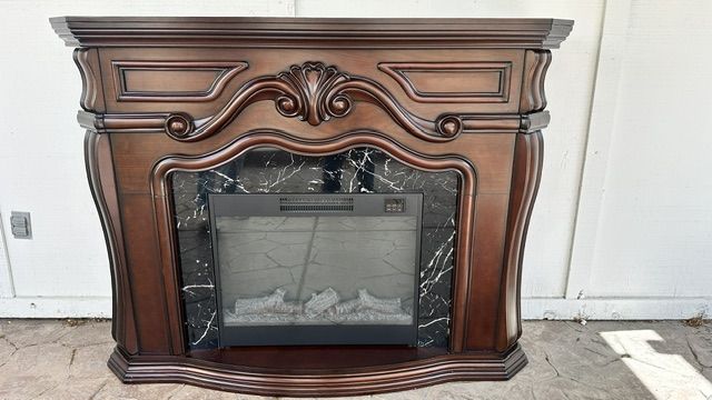 Ornate Cherry Wood Electric Fireplace Mantel with Black Marble Surround