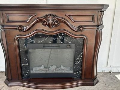 Ornate Cherry Wood Electric Fireplace Mantel with Black Marble Surround