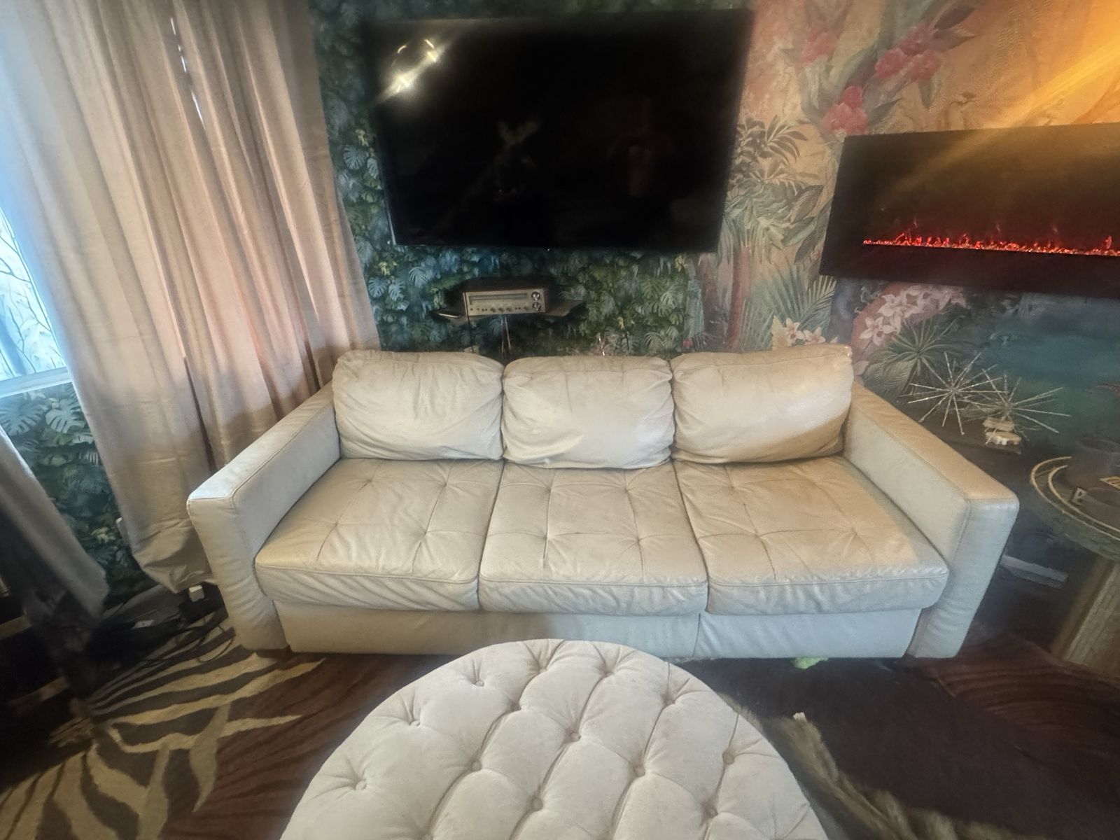 The century champagne colored leather sofa