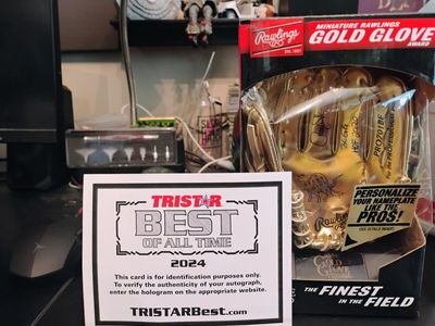 Rawlings Miniature Gold Glove Award Larry Walker Autographed and certified.