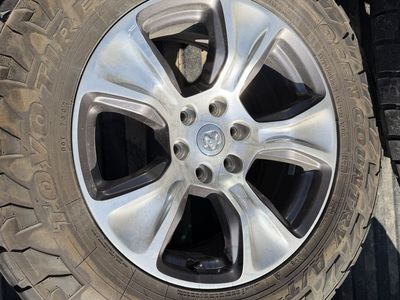 Used Ram Factory Wheels & Toyo Open Country A/T III Tires