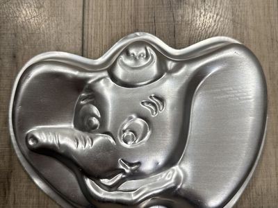 Dumbo cake pan, and package of cake stencils
