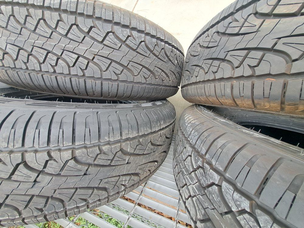 new.   Pirelli 265 70 17.  take offs