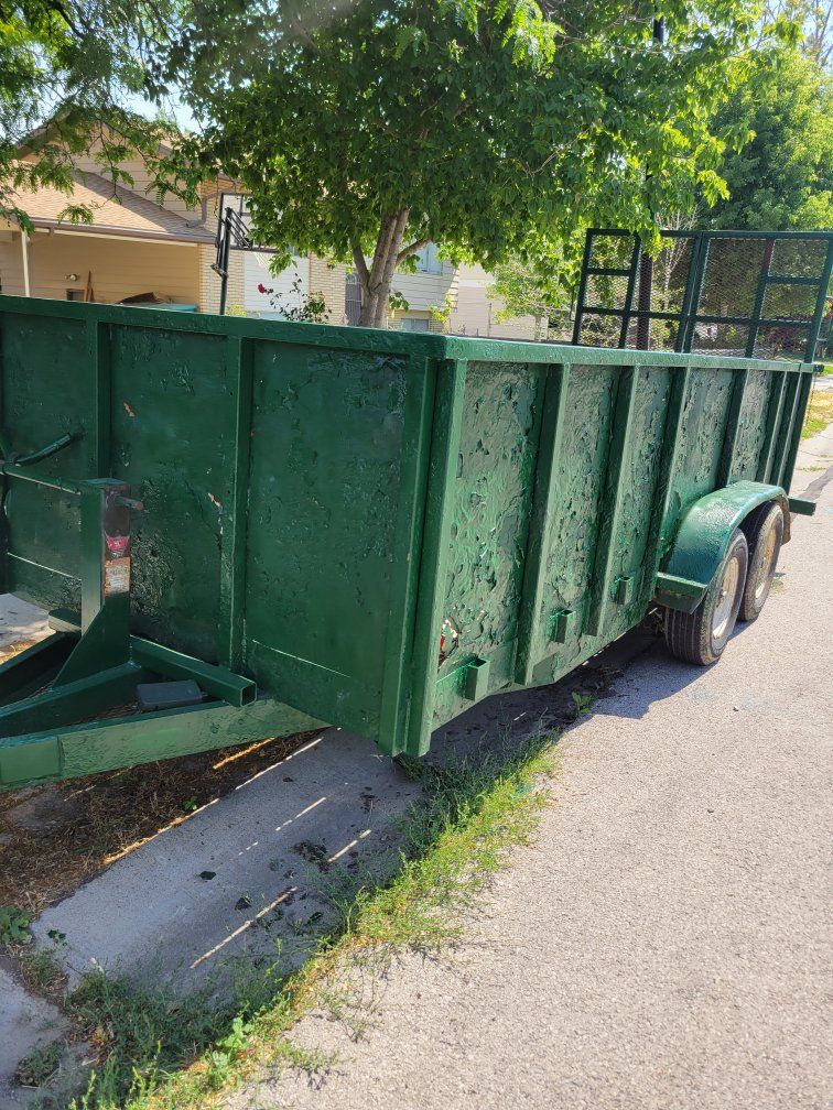 Heavy-Duty Green Utility Trailer with Dual Axles - Great for Hauling, Landscaping, and Debris Removal