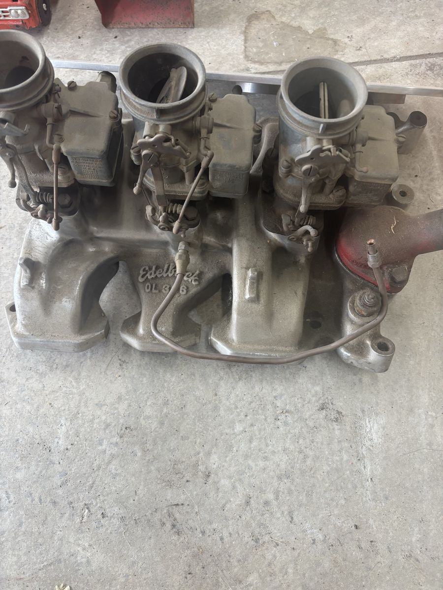 Vintage edelbrock olds tripower intake and carbs