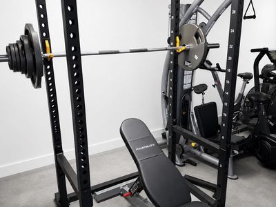 Powertec Power Rack/Bench & Olympic Weight Set