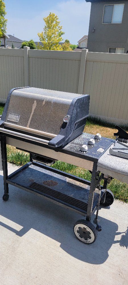 Weber Genesis Grill - 3-Burner Propane Gas Grill with Side Tables and Storage Cart