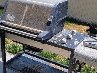 Weber Genesis Grill - 3-Burner Propane Gas Grill with Side Tables and Storage Cart