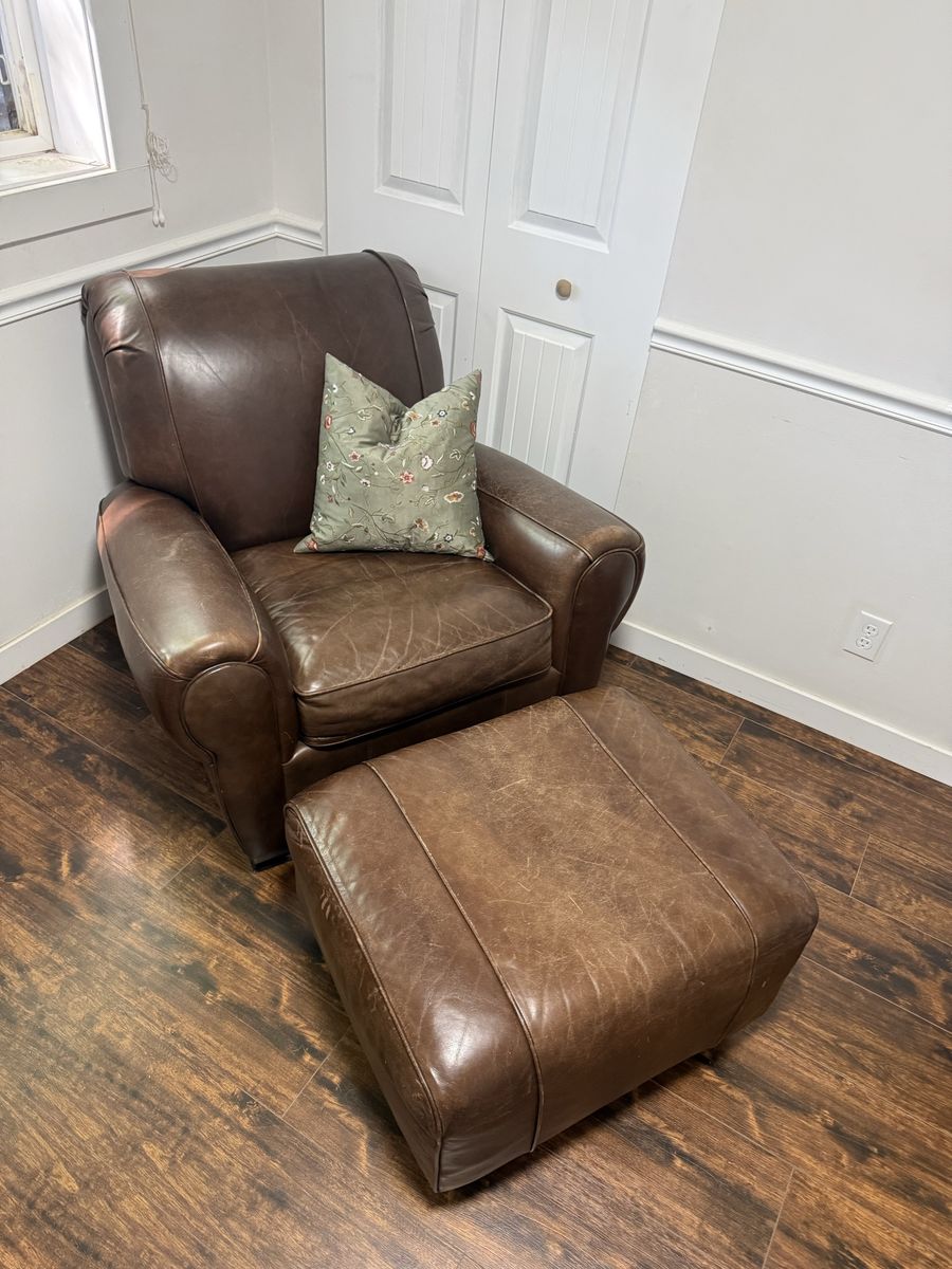 Luxurious Brown Leather Armchair and Ottoman Set - Comfortable & Stylish Seating, distressed
