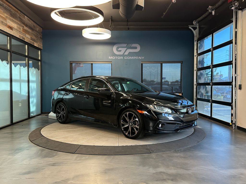 2021 Honda Civic Sport — rebuilt & branded title, 22% below market