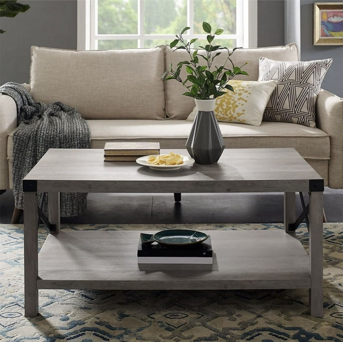 Rustic Gray Wood Grain Coffee Table with Lower Shelf and Metal Corner Brackets