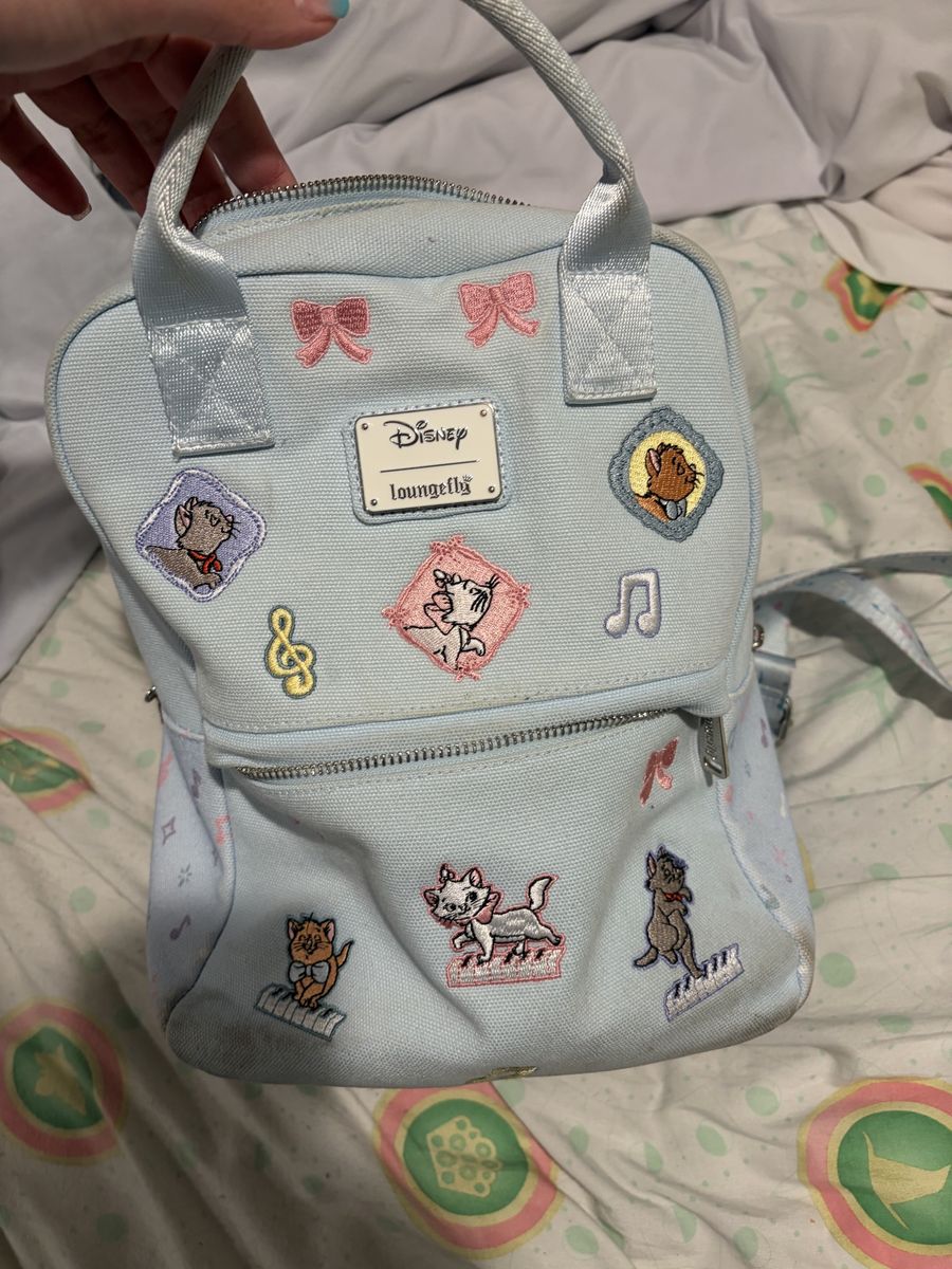 Disney cats lounge fly fabric backpack