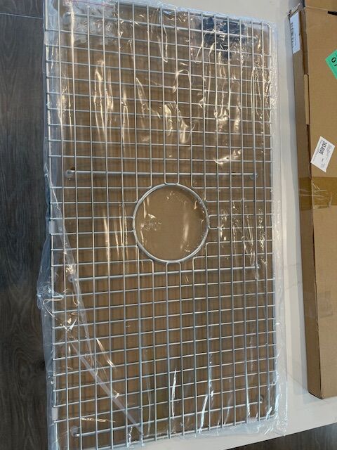 New sink grid approx. 15.5 by 28.5 for sale, $35.00