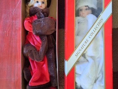 2 old porcelain dolls