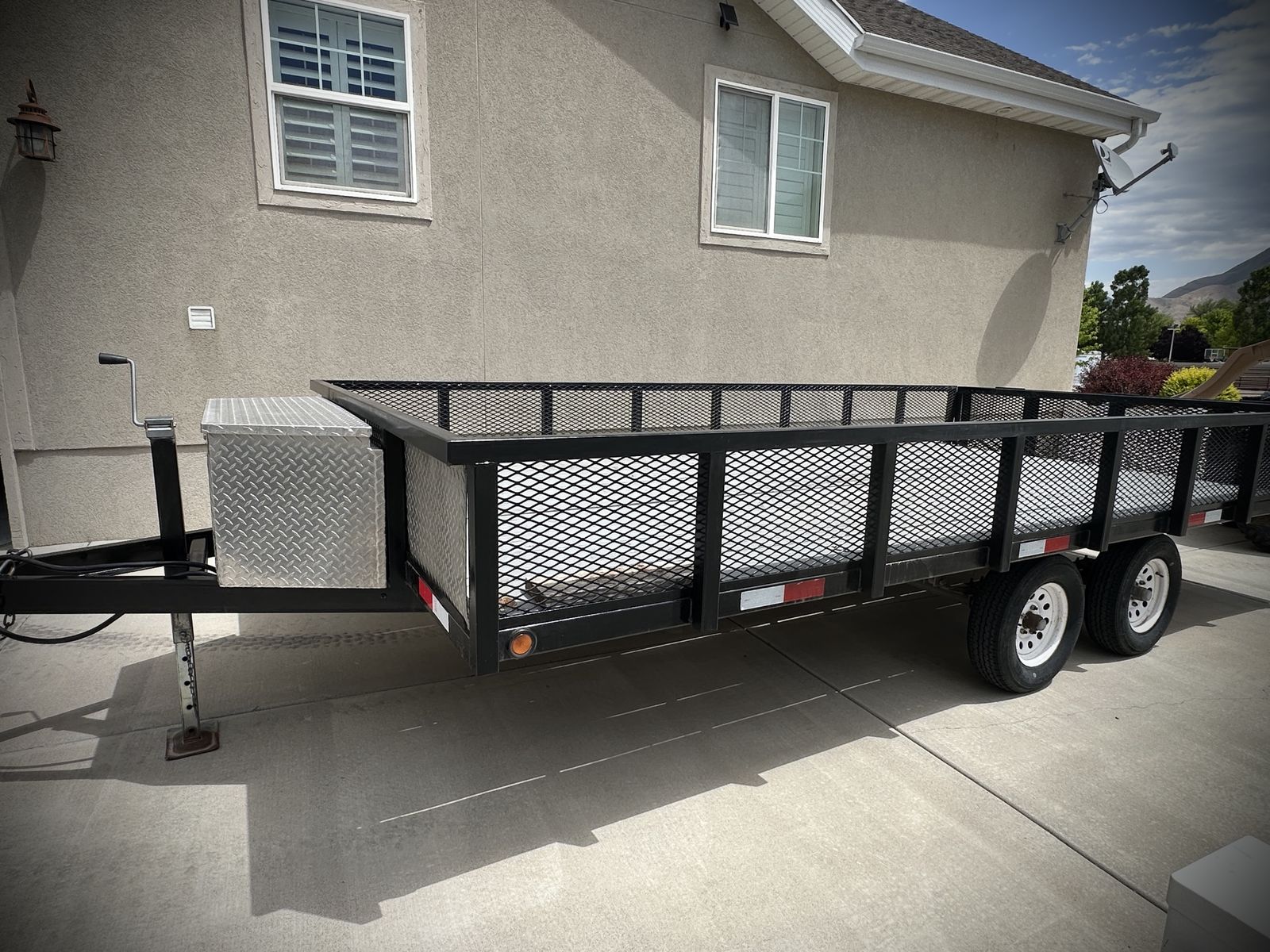8x16 dual axle ATV, UTV utility trailer.  New 10x2 wood deck.  Axle bearings serviced last year. Storage Box, Excellent Conditio