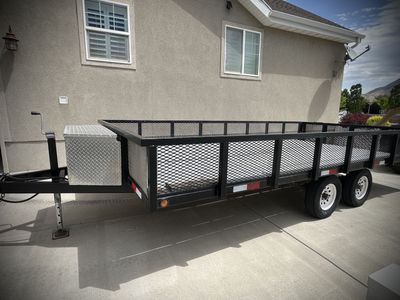 8x16 dual axle ATV, UTV utility trailer. New 10x2 wood deck. Axle bearings serviced last year. Storage Box, Excellent Conditio