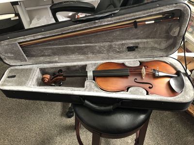 new 4/4 beginner violin never used