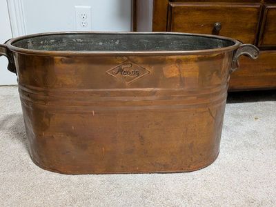 antique copper wash basin with intact wood handles