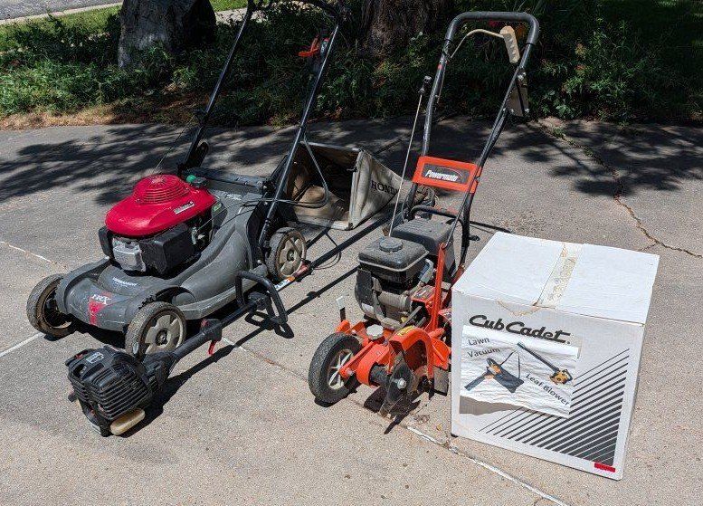 BUNDLE x4 Lawn Equipment - (A) Honda HRX 217 - (B) Powermate Edger - (C) Craftsman 4-Cycle Trimmer - (D) Cub Cadet blower