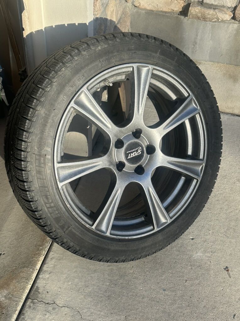 Four 18 Snow Tires Mounted on Wheels