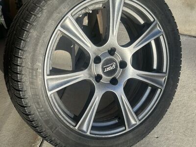 Four 18 Snow Tires Mounted on Wheels