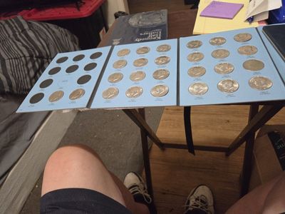 Kennedy half dollars plus book 26 coins or 3 dollars each