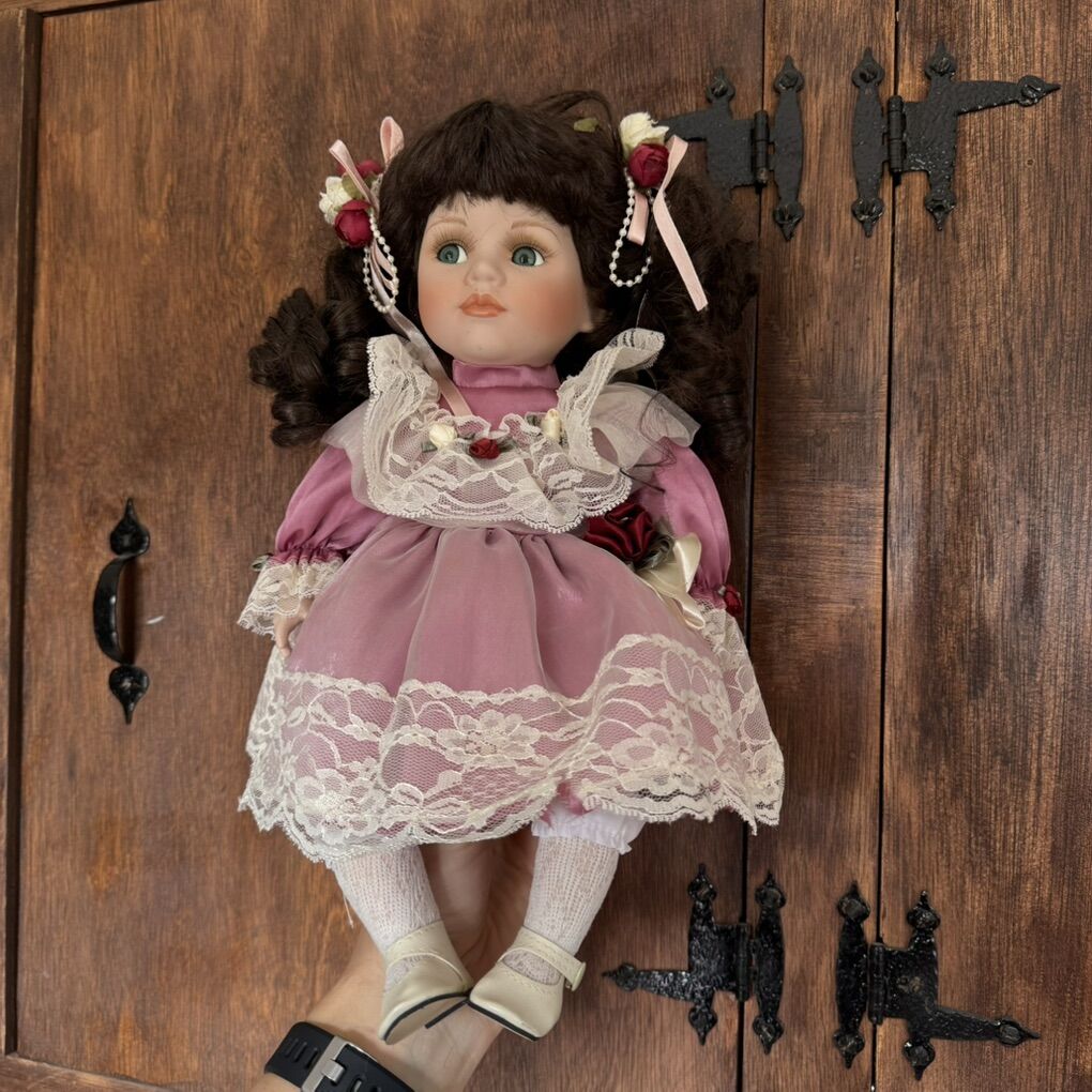 Geppetto Porcelain Doll Sitting Plays Edelweiss