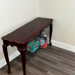 Elegant Wood Console Table with Cherry Finish, Cabriole Legs, and Scalloped Apron