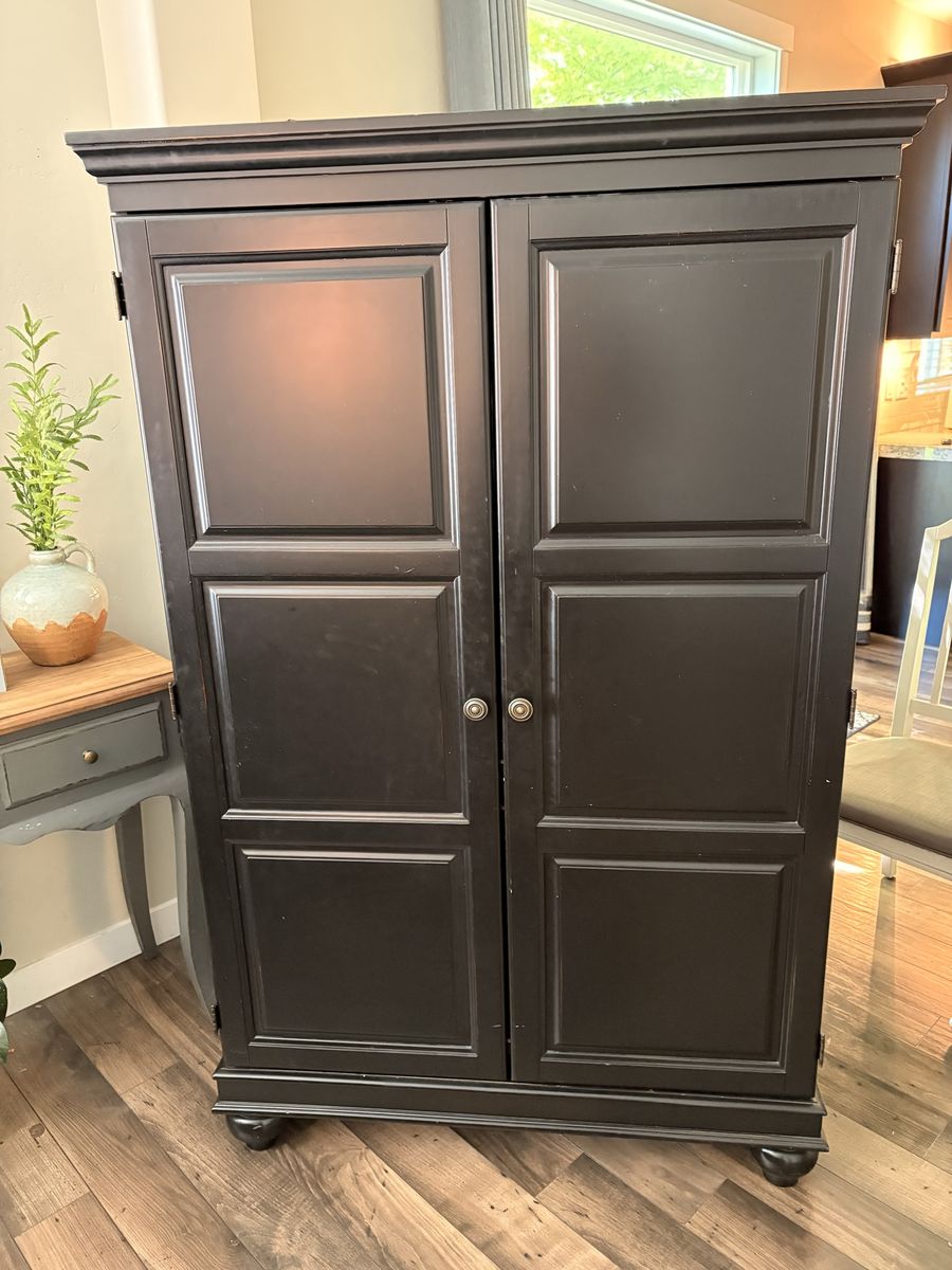 Black Wooden Armoire Wardrobe Cabinet with Two Doors and Drawers. Solid wood.