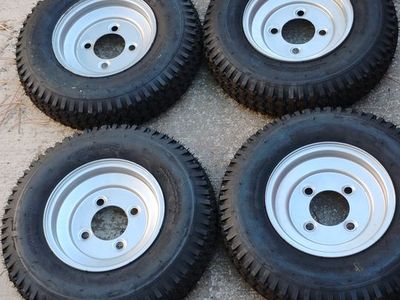 Golf cart brand new tires and rims take offs