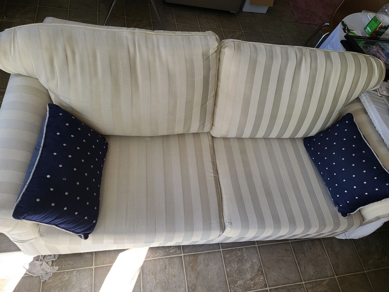 Ivory-colored fabric 2-seater loveseat or sofa or couch or settee with polyurethane foam seat cushions