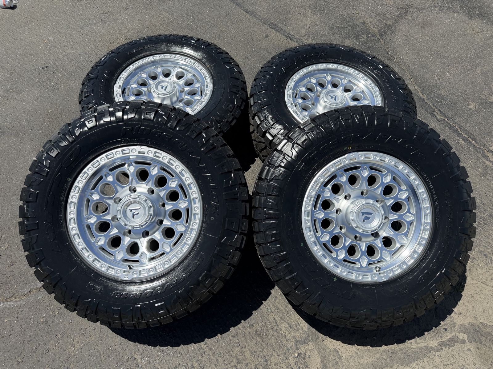 New LT295/70r18 Nitto Ridge Grappler Silver Fittipaldi FT101 8x180 Chevy GMC Duramax 2011+ Silverado Sierra wheels and tires 8