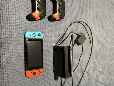 Nintendo Switch Console w/ Joy-Cons & Pro Controllers, Dock, Charger - Neon Red/Blue