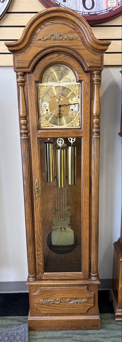 Howard Miller Grandfather Clock: Traditional Oak Finish, Brass Dial, Triple Chime | Original Papers | Recently Serviced