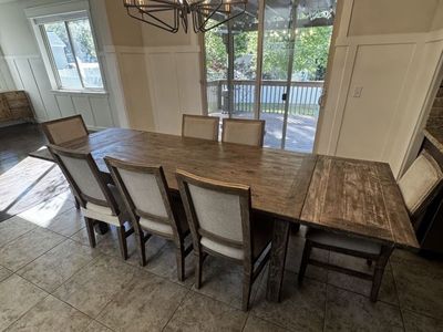 115" length Kitchen Tanle with 7 chairs. Excellent condition.