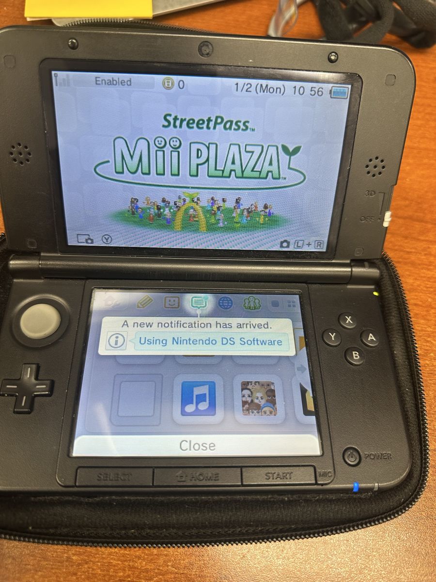Nintendo 3DS XL Blue Handheld Gaming Console with Two DS Games & Carrying Case
