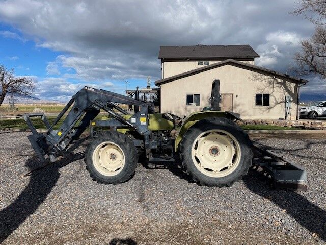 For Sale-  2002  80 HP 4 X 4 Tractor w/Loader