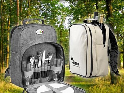 Picnic bag with silverware, cups, napkins, in an insulated bag