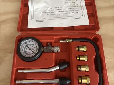 Cylinder compression test tool