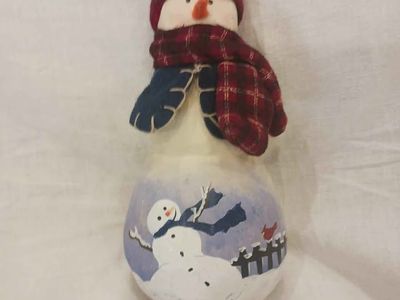 Snowman with snowman painted on belly