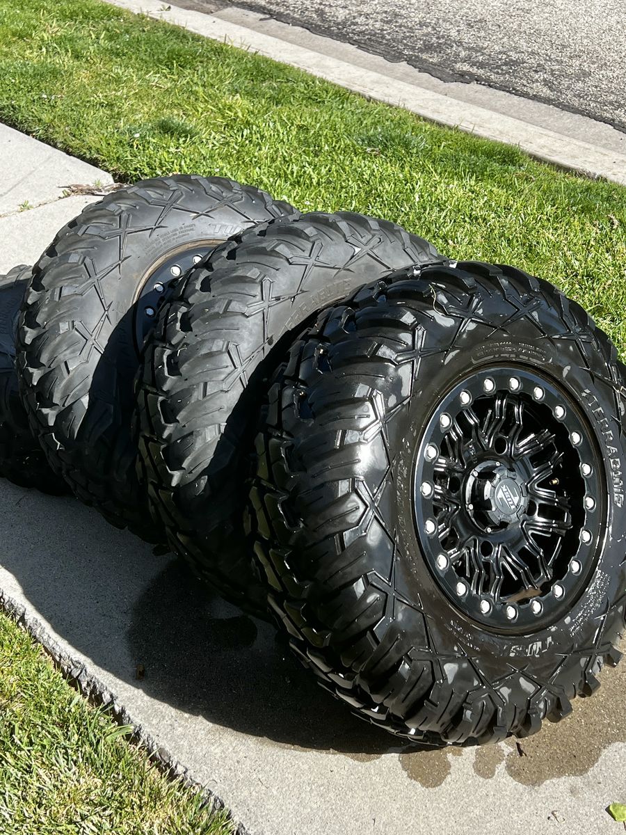 Tusk Set of 28x10-14 Tusk TERRABITE 8-Ply Radial UTV Tires